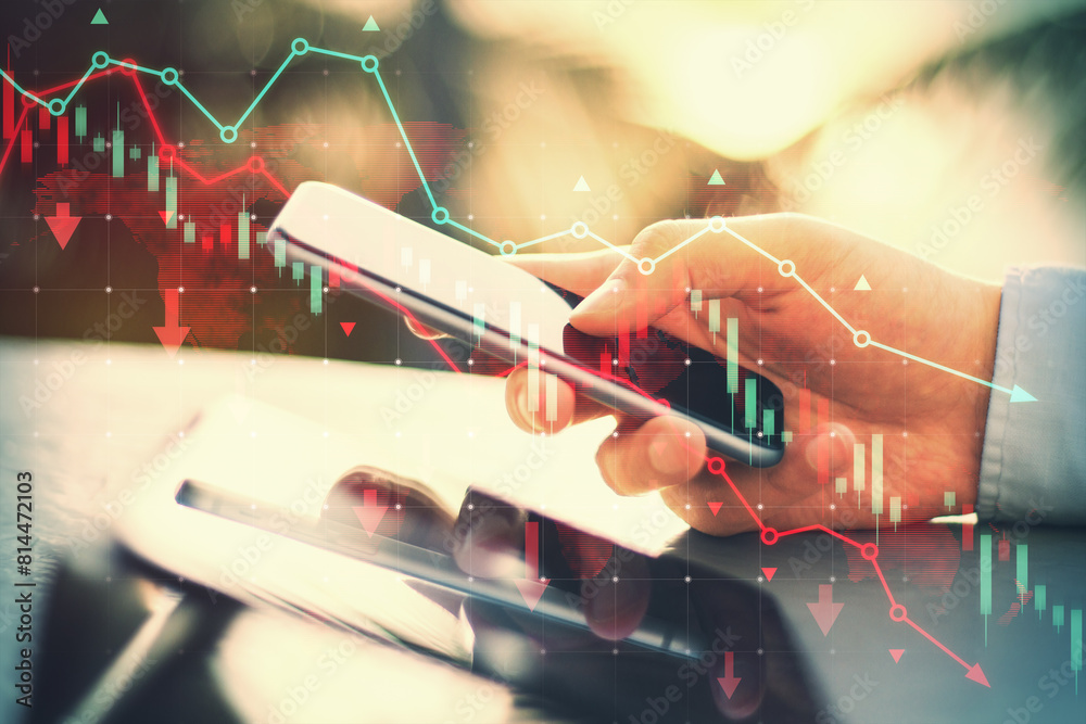 Aufkleber Side view of male hands using tablet and cellphone at desk with falling red forex chart and map on blurry outdoor background. Trade and crisis concept. Double exposure.