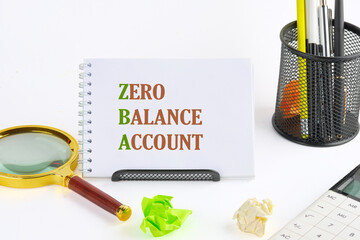 Business concept. Copy space. Concept words ZBA zero balance account on a notepad standing on a stand