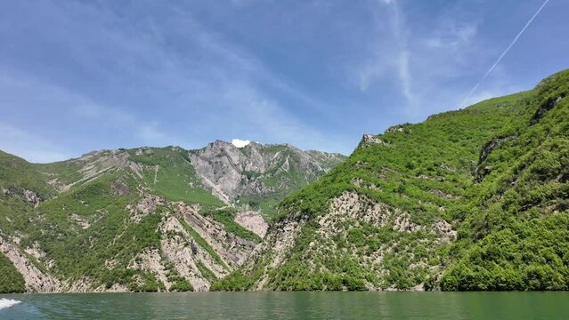 Albania shala river, Komani lake, mountain view from boat in Albania. Summer in Albania on a boat in mountain landscape  