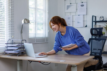 Portrait of happy smile beautiful business asian woman working office desk computer. Small business...
