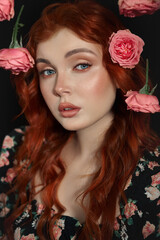 Naklejka premium Woman with red hair, pink rose near her face, beauty face cosmetic makeup