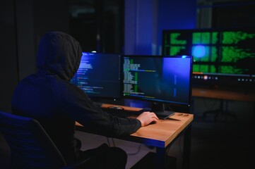 Wanted hackers coding virus ransomware using laptops and computers. Cyber attack, system breaking...