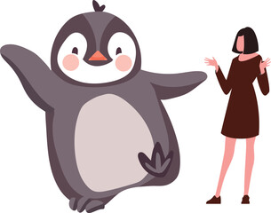 Girl having fun with penguins.