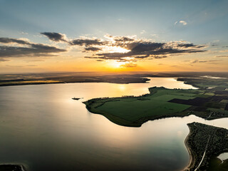 aerial view over costesti reservoir at prut river on the border of moldova and romania during sunset