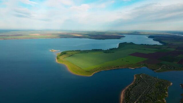 aerial view over green peninsula at costesti reservoir on the prut river on the north of moldova
