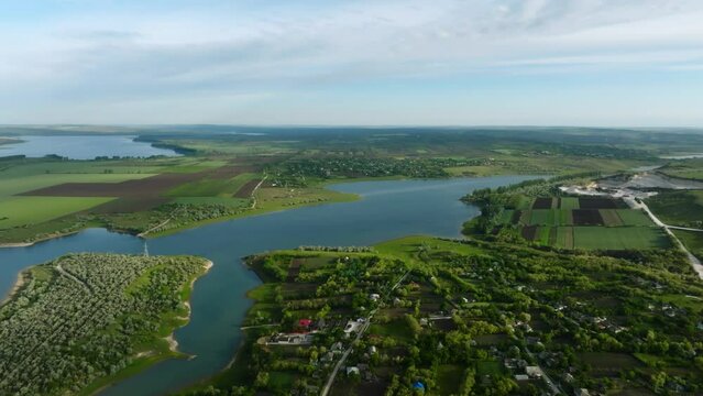 aerial view over duruitoarea village, costesti reservoir and prut river on the north of moldova at the border with romania