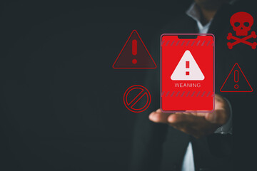 Warning sign,Business,Danger,Caution concept.,Businessman showing hand withred  wearning sign,caution sign,attention sign on blac background.