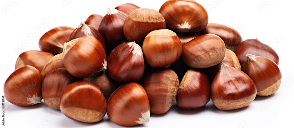Poster a top down view of a pile of sweet chestnuts isolated on a blank white background the copy space ima
