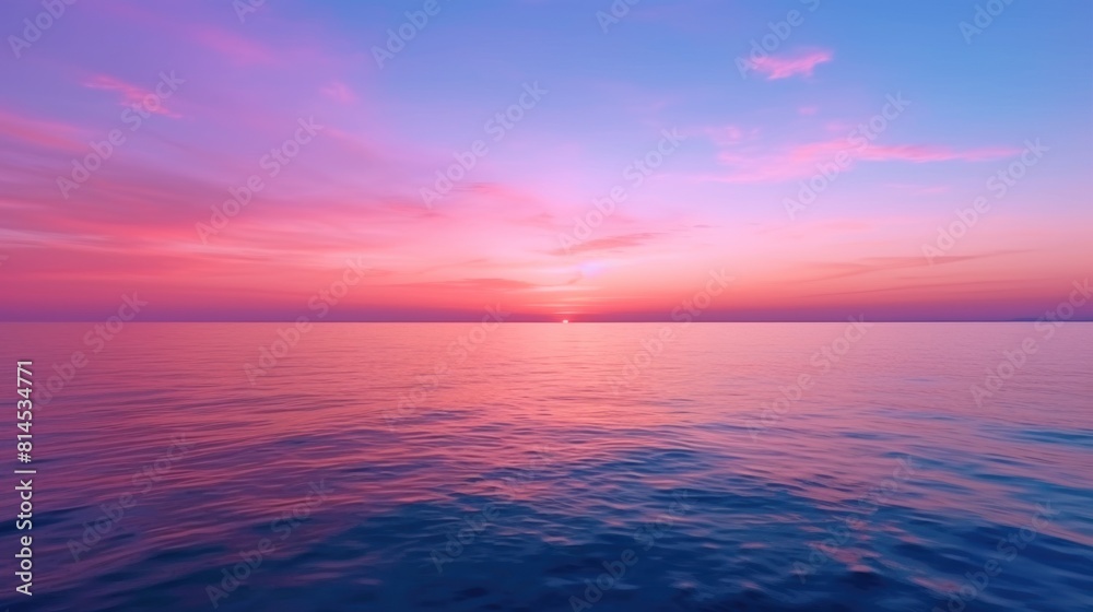 Sticker beautiful sunset over the sea. the color of the sky changes from blue to purple and pink, creating a