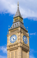 Big Ben the clock tower in a blue sky (London, England, United Kingdom)