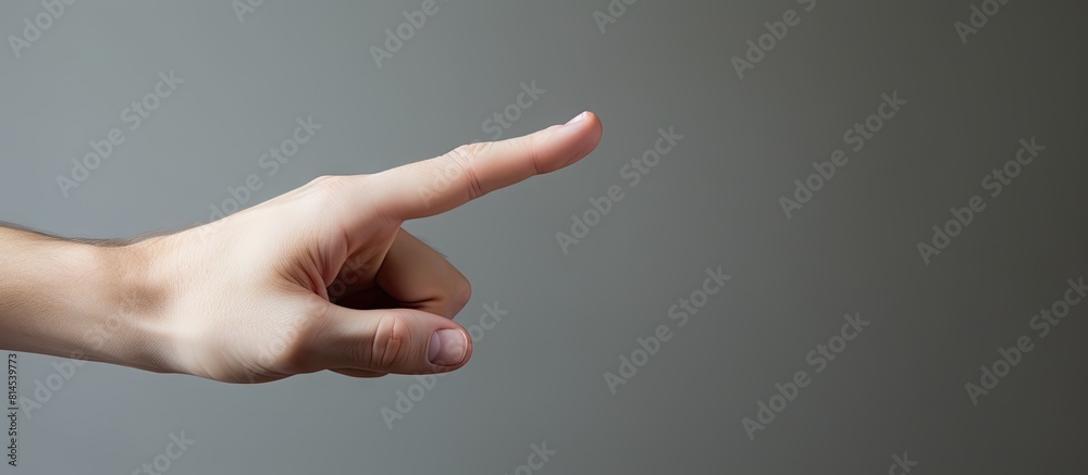 Poster The hand gesture of the isolated model on a plain background indicates a break sign Copy space image