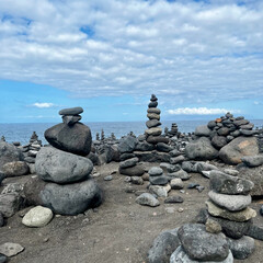 Stone figures on a beach with a beautiful sky in Tenerife. Canarian Island. Balance and serenity