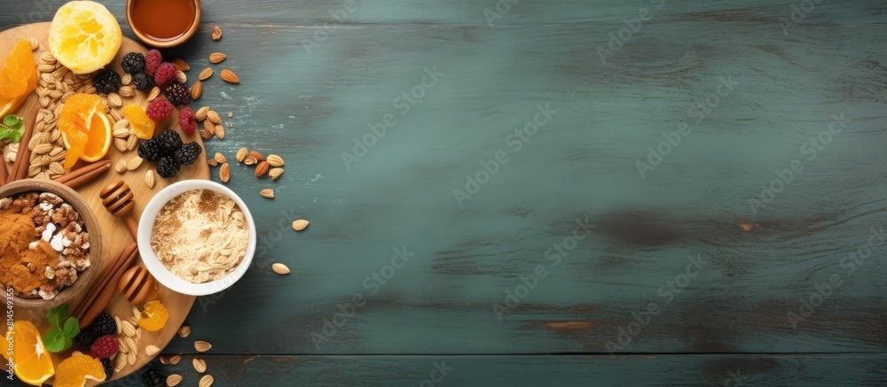 Poster A healthy breakfast set consisting of granola with dry fruits nuts and honey presented from a top view with ample copy space in the image