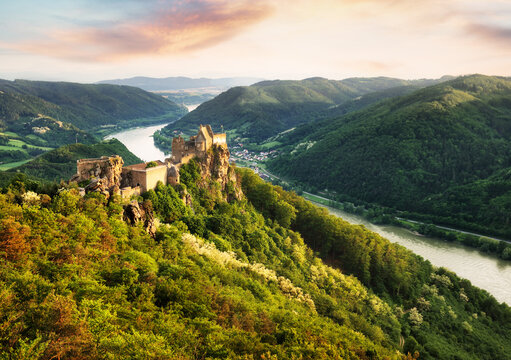 Beautiful landscape with Aggstein castle ruin and Danube river at sunset in Wachau, Austria