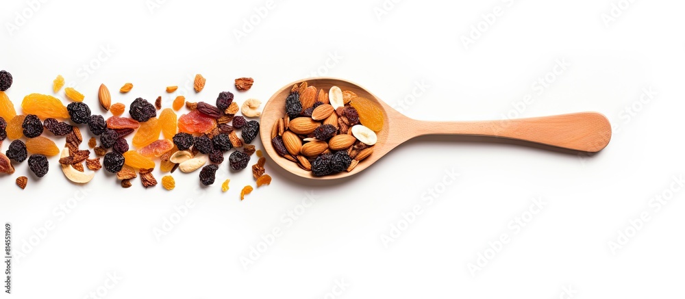 Aufkleber a top down view of dried fruit tea displayed on a white background with a wooden spoon nearby there 