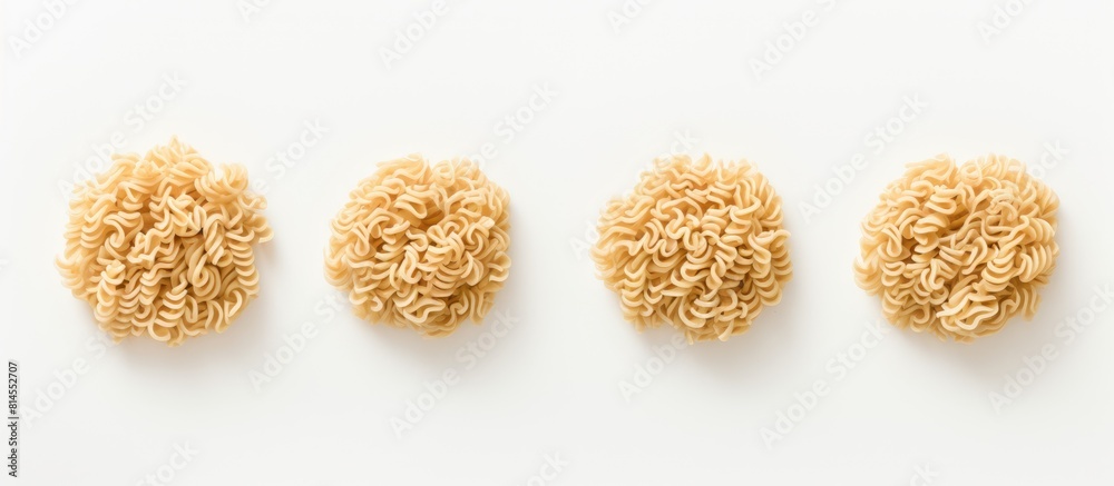 Poster Wholegrain instant noodles dry and uncooked are shown in a top view on a white background The image has a soft light and copy space for composition