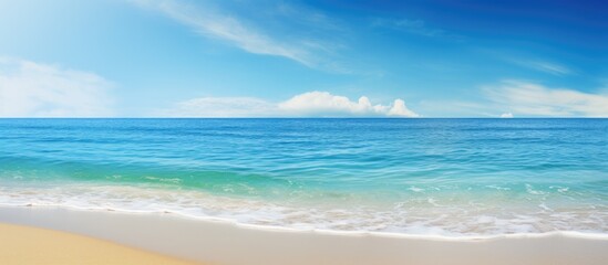 Obraz premium Sunny day at the beach with a clear ocean water view against a serene nature background ideal for a copy space image