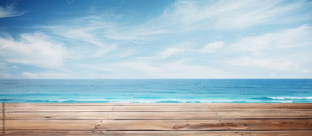 Poster a wooden table surface placed on a serene backdrop of the summer ocean and sky creates a perfect ble
