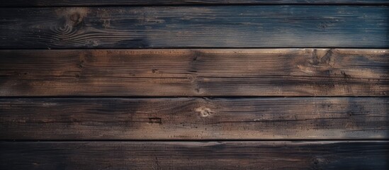 Obraz premium Vintage photo filter applied to an empty dark wooden backdrop with vertical boards The backdrop has a textured wood surface with visible scratches and scrapes on the old paint Ample copy space is ava