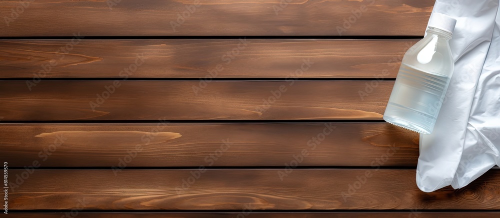 Aufkleber Health concept Hand sanitizer and surgical mask placed on a wooden table creating a visually appealing flat lay image with copy space