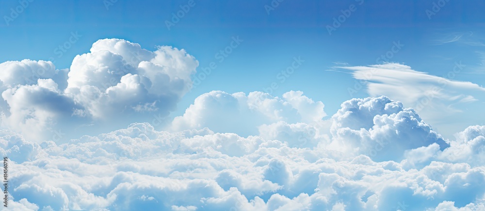 Poster A breathtaking sky filled with fluffy white clouds perfect for capturing a stunning image with ample empty space