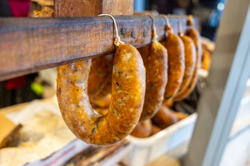 portuguese smoked sausages on wooden stick, alheira. Northern Portugal