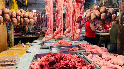 A butcher shop with a variety of meats on display