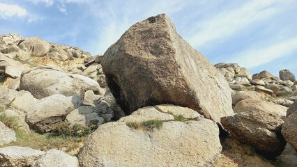 A large rock hilly background
