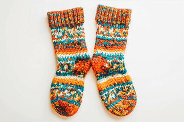 A pair of cozy woolen socks, promising warmth and comfort on chilly days, showcased against a clean white background.