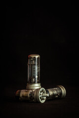 ELECTRON TUBE - A device in a closed glass housing used in electronic circuits to control the flow...