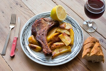 pork steak with potatoes, baked in the oven