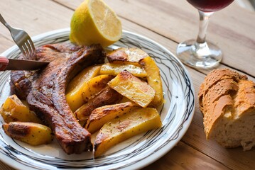pork steak with potatoes, baked in the oven