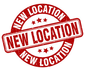 new location stamp. new location label. round grunge sign