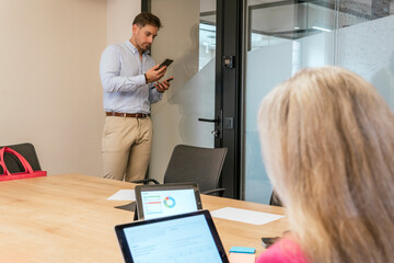 Modern coworking space with business professionals at work