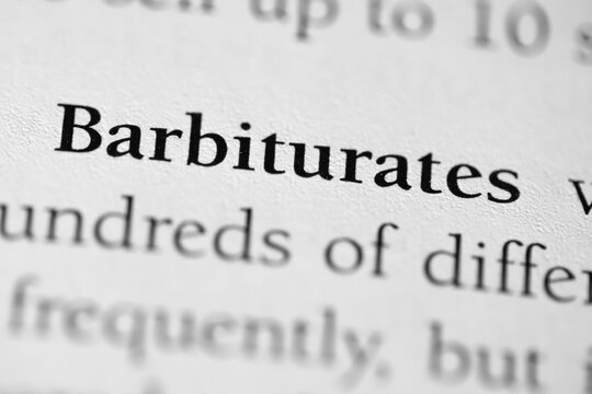 Closeup of the medical or addictive pharmacology term 'barbiturates' in black on white paper