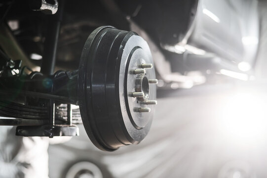 Close-up of a car's drum brakes.