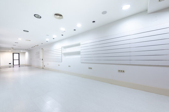 Spacious empty apartment with white interiors