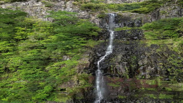 Drone footage of Lagoa do Vento and Risco Waterfall in daylight in Madeira island, Portugal