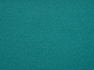 A captivating teal felt surface that evokes the adventurous spirit of tropical seas and the...