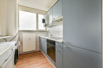 Compact modern kitchen interior in a city apartment