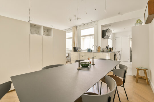 Modern kitchen with integrated dining space