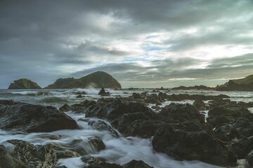 Dramatic cloudscape over the cliffs and sea. Vila Franca do Campo, Sao Miguel, Azores