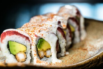 Plate with freshly prepared sushi rolls, ready to be enjoyed