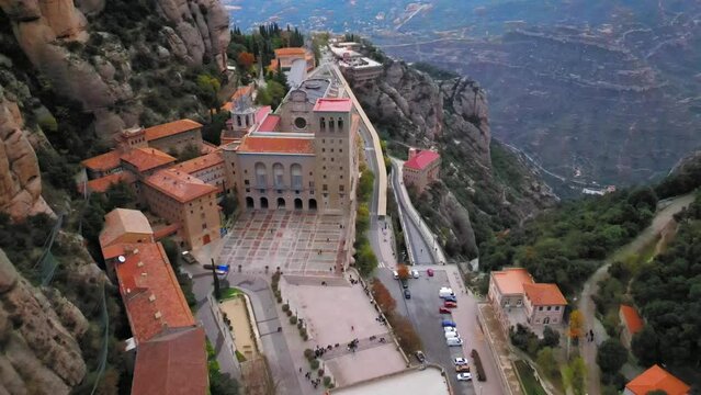 Drone footage of Santa Maria de Montserrat Abbey on the mountain of Montserrat in Catalonia, Spain