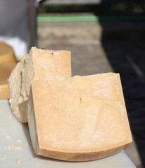 Closeup shot of sectioned Parmigiano Reggiano cheese