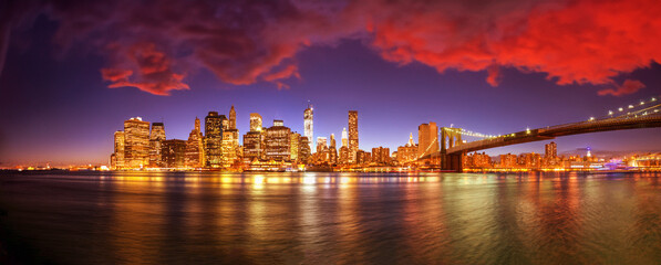 Downtown Manhattan night lights, panoramic view from Brooklyn Bridge Park