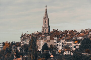 Fototapeta premium Picturesque view of the city of Bern, Switzerland, with the iconic spire of the cathedral