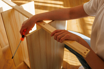 Self-assembly modern furniture by woman