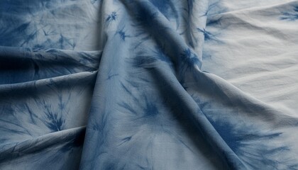 pattern of blue dye on cotton cloth dyed indigo fabric background and textured