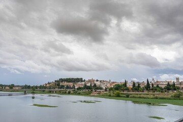 Fototapeta premium Views of the city of Badajoz and the mighty Guadana river from one of the most important bridges